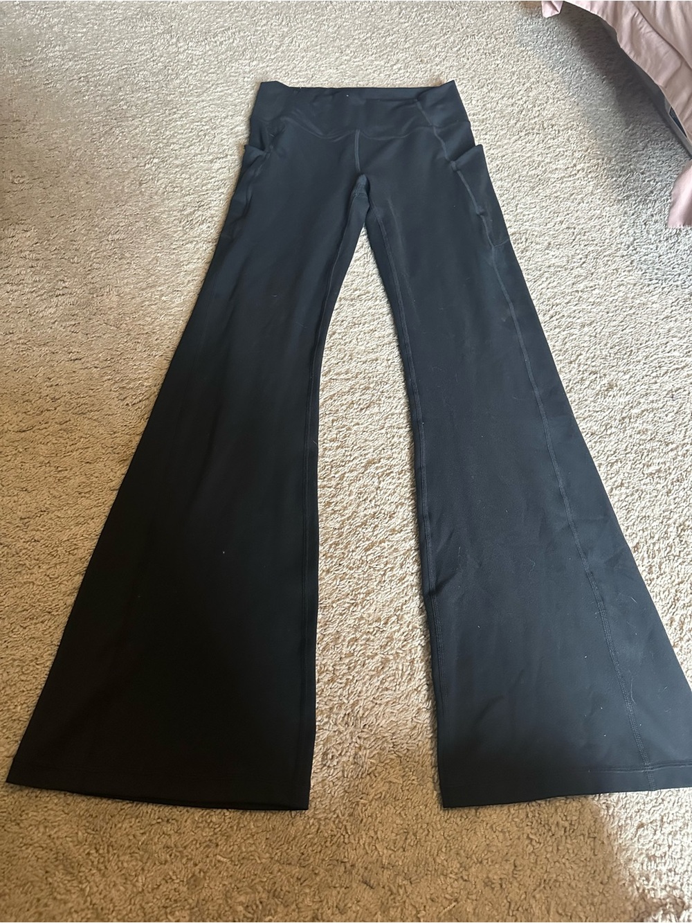 Fabletics Black High-Rise Flare Leggings with Side Pockets